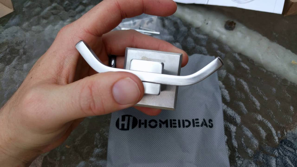TLDR: This towel hook is solid and strong a good choice, Only downside is the logo etched to the front