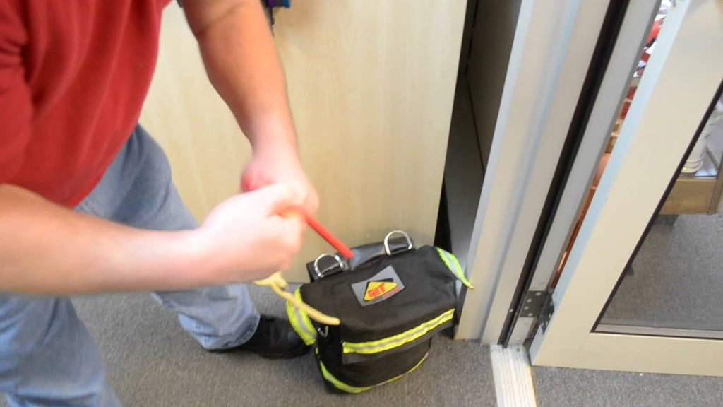 Place the Forged Steel Hook in between door and hinge to keep the primary line attached to the exit.