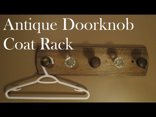 Some doorknobs from my "stuff" bin make excellent hooks for this wall mounted coat rack