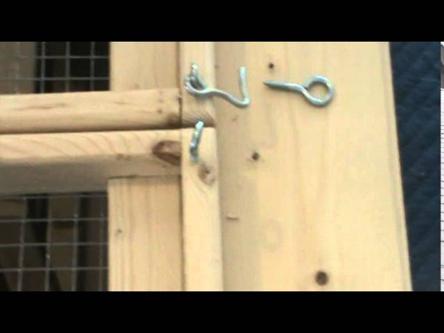 Installing lock hooks on a cage door.