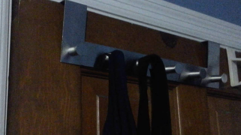 This GWHOLE Stainless Steel Over The Door 6 Hooks Towel Organizer Rack is perfect for me to use on my sons bedroom door